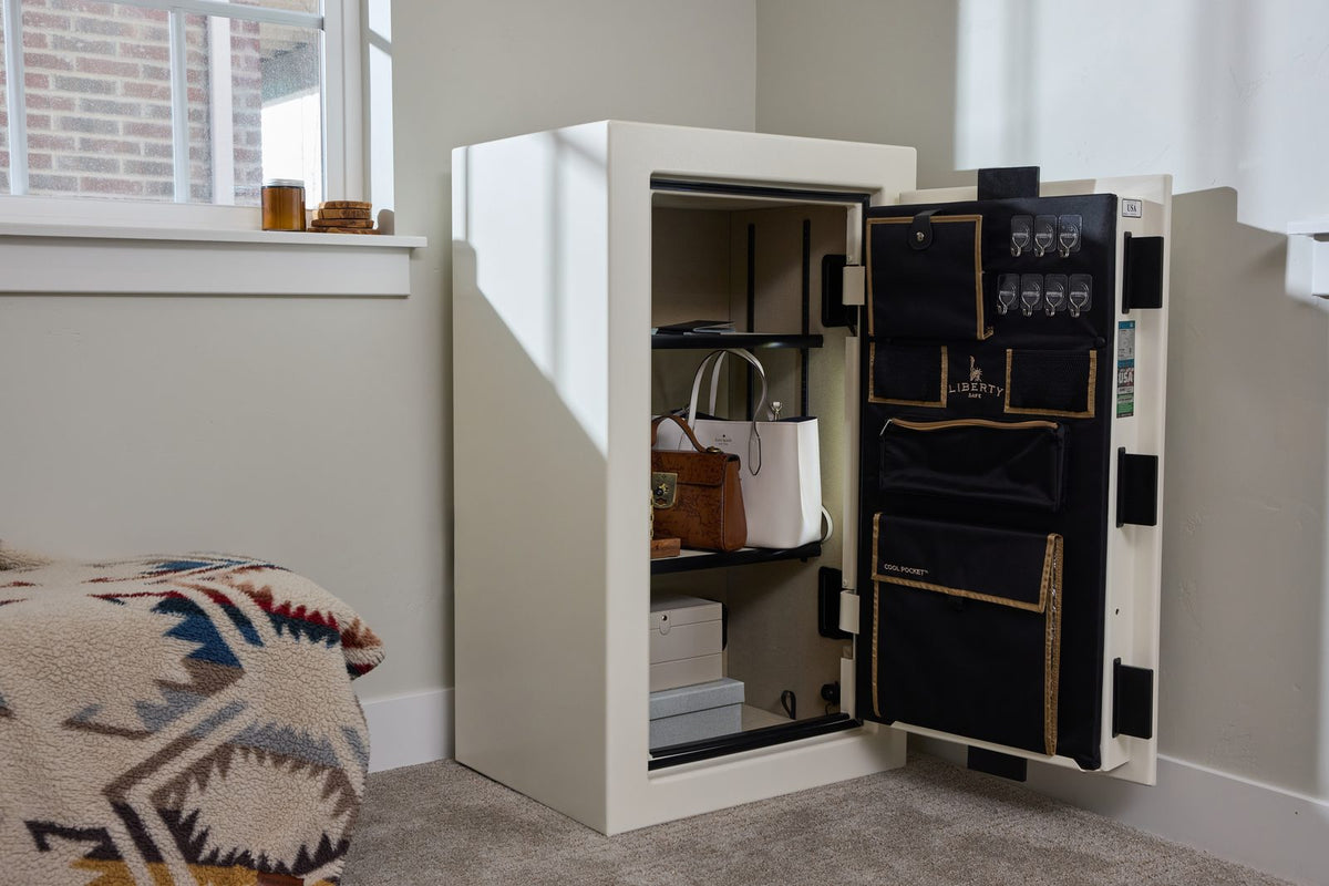 Open safe with various items inside in a room setting