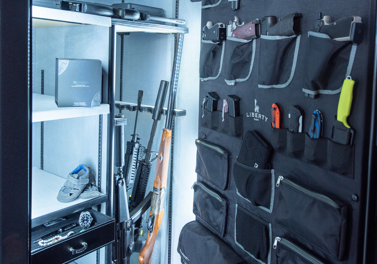 Storage system with shelves and wall-mounted pouches for tools and equipment.